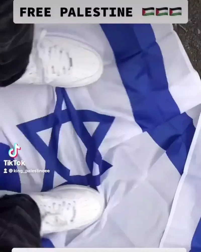 Bazrouk posts video on Instagram Aug 30 2021_Bazrouk stomps on and drags Israeli flag on the floor.mp4 _#56